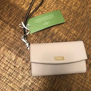 Brand new Kate Spade cream Wrist wallet